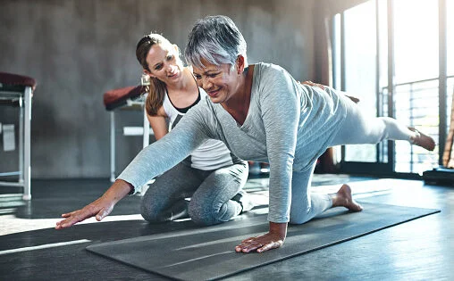 Shot of a senior woman working out with her physiotherapist