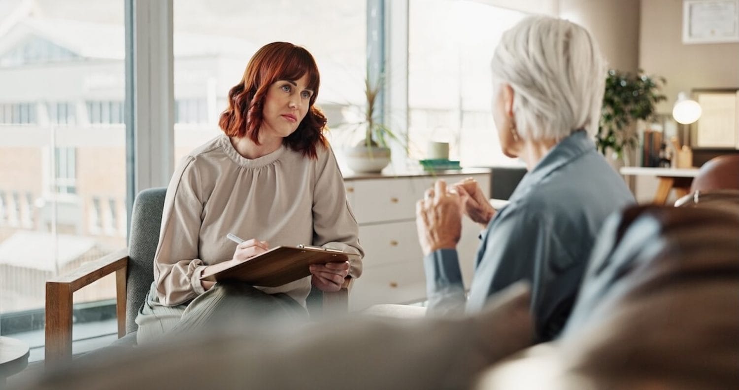 Older woman getting grief support