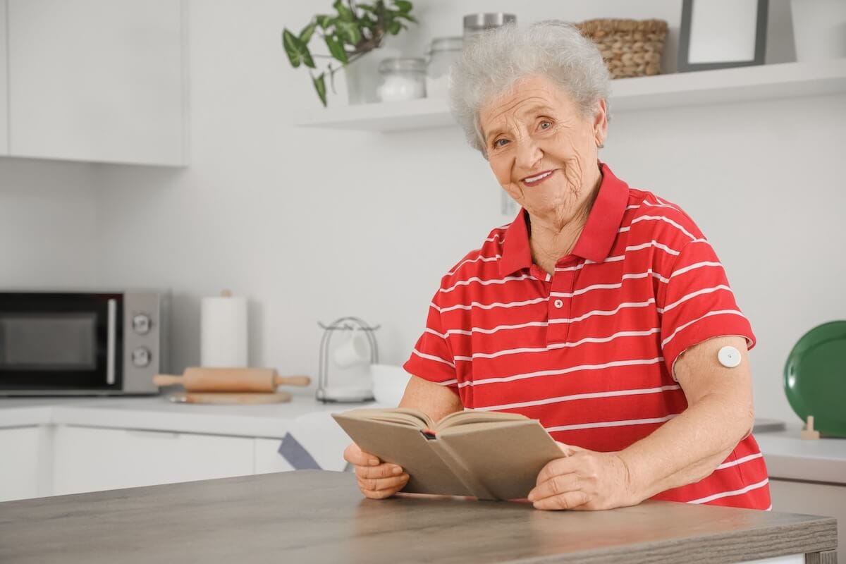 Older woman with a diabetes-controlling patch - Rockbridge Oaks Older woman with a diabetes-controlling patch
